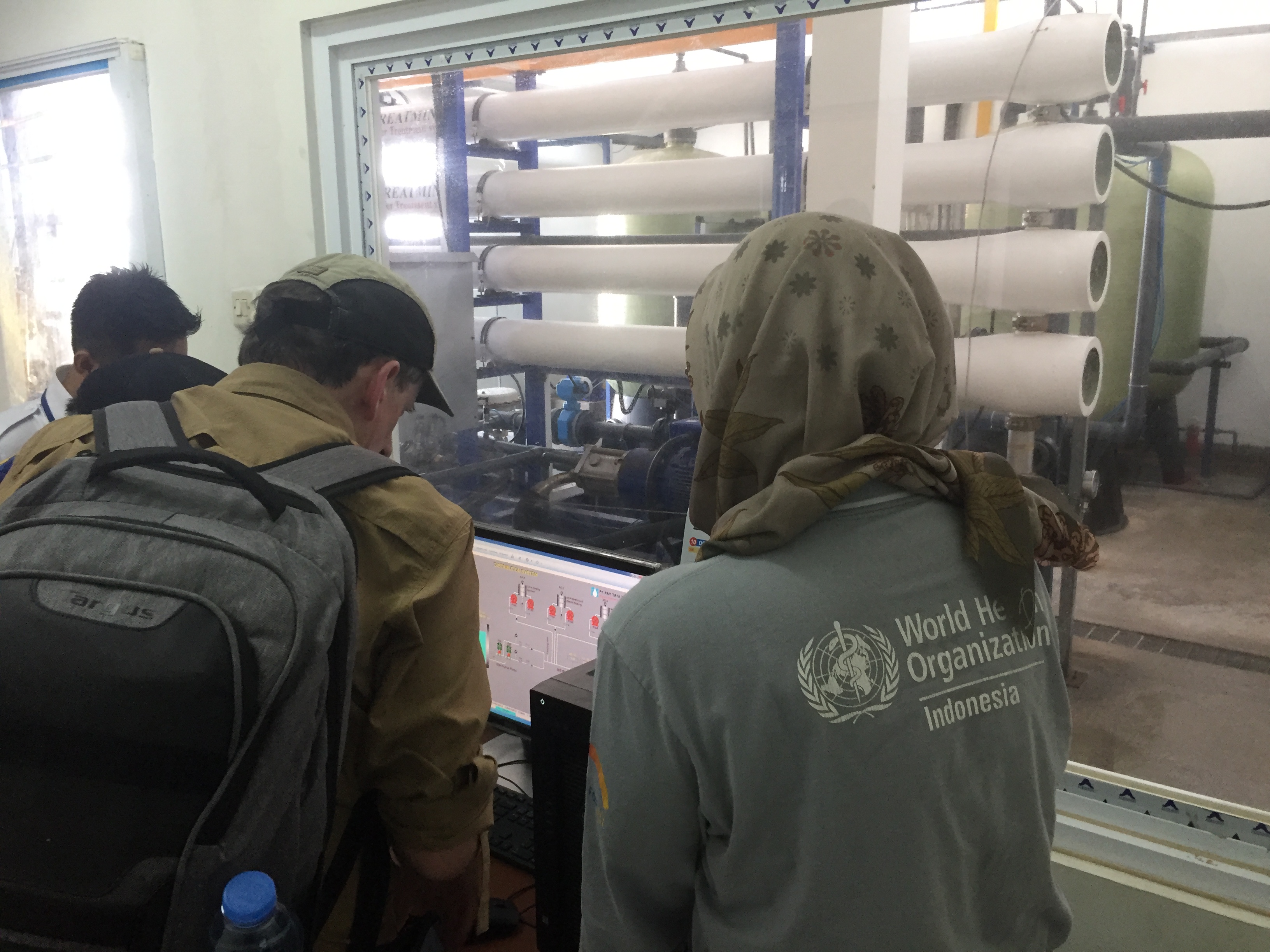 WHO staff test water quality